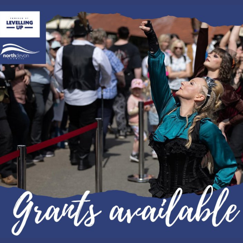 Image shows women dancing in the street in front of a crowd to promote Flourishing Culture Grants available for Ilfracombe and North Devon