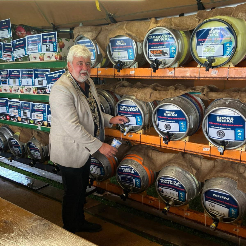Mayor of Ilfracombe Pouring a pint at the Ilfracombe Beer festival 2025