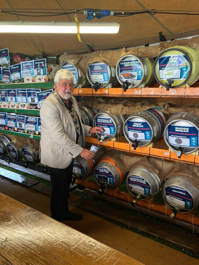 Mayors Blog - Mark Fay pouring a pint of beer at the Ilfracombe Beer Festival 2025